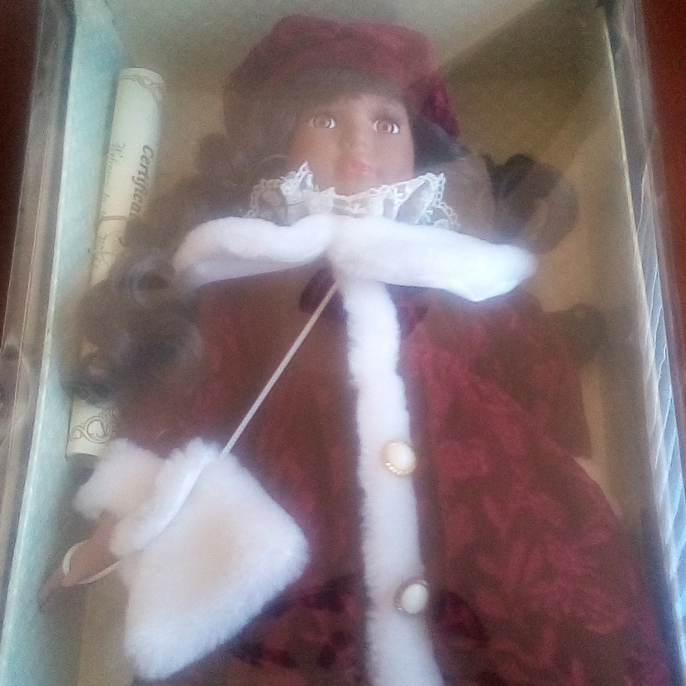Genuine fine porcelain doll